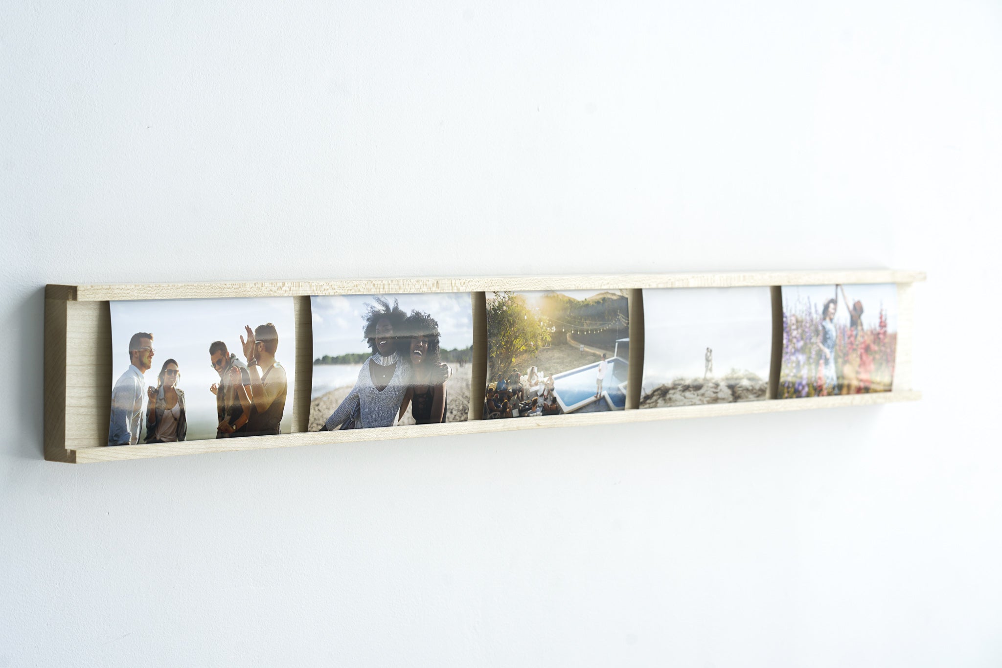 Daily Gallery Photo Bar Frame made of Maple hardwood, showcasing multiple 4x6 photos in a modern design.