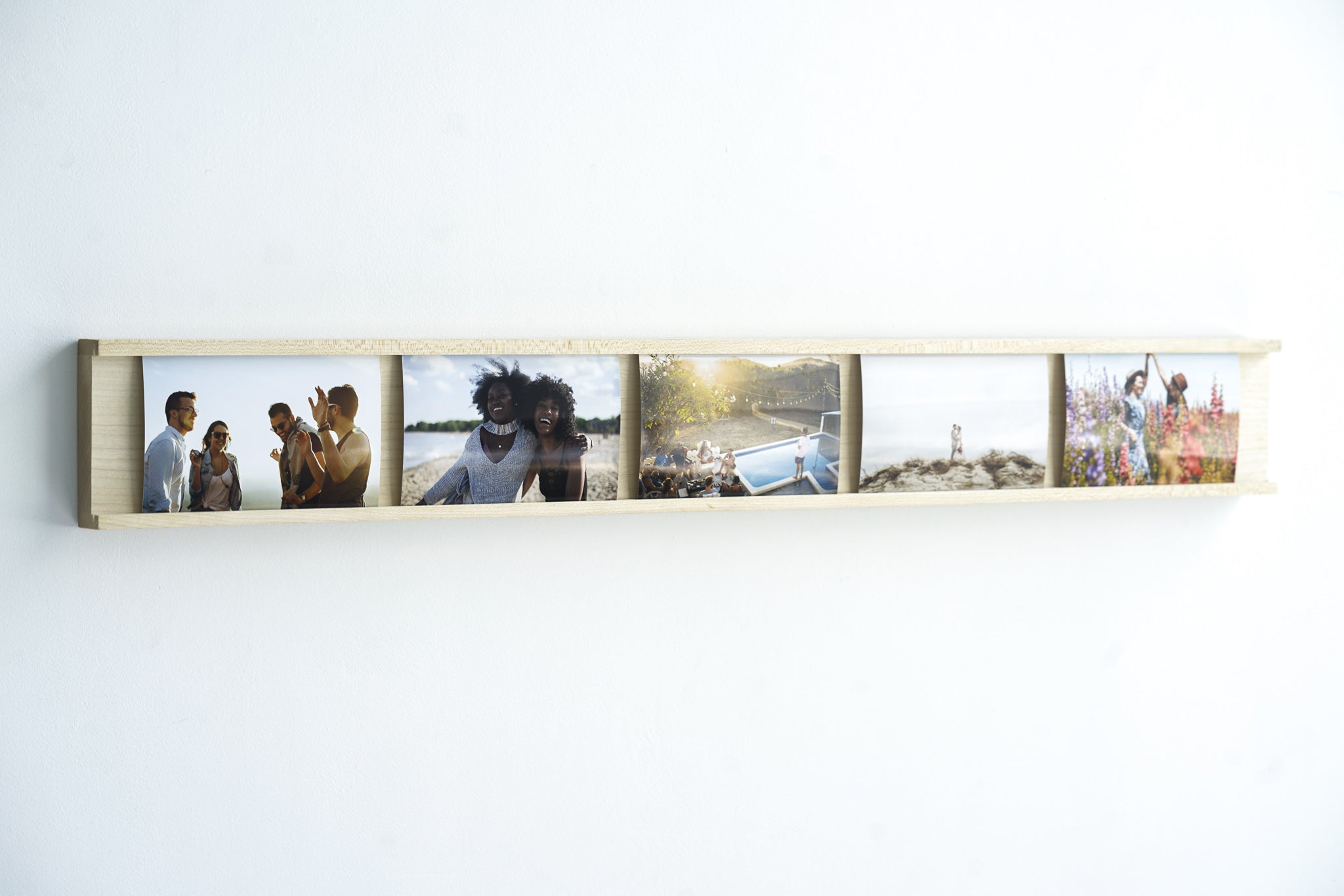 Daily Gallery Photo Bar Frame made of Maple hardwood, showcasing multiple 4x6 photos in a modern design.