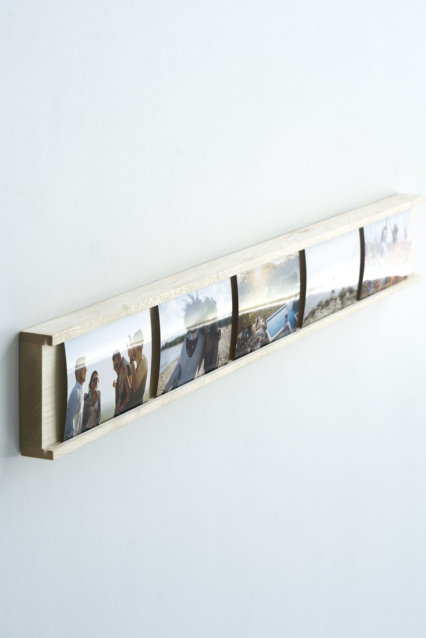 Daily Gallery Photo Bar Frame made of Maple hardwood, showcasing multiple 4x6 photos in a modern design.