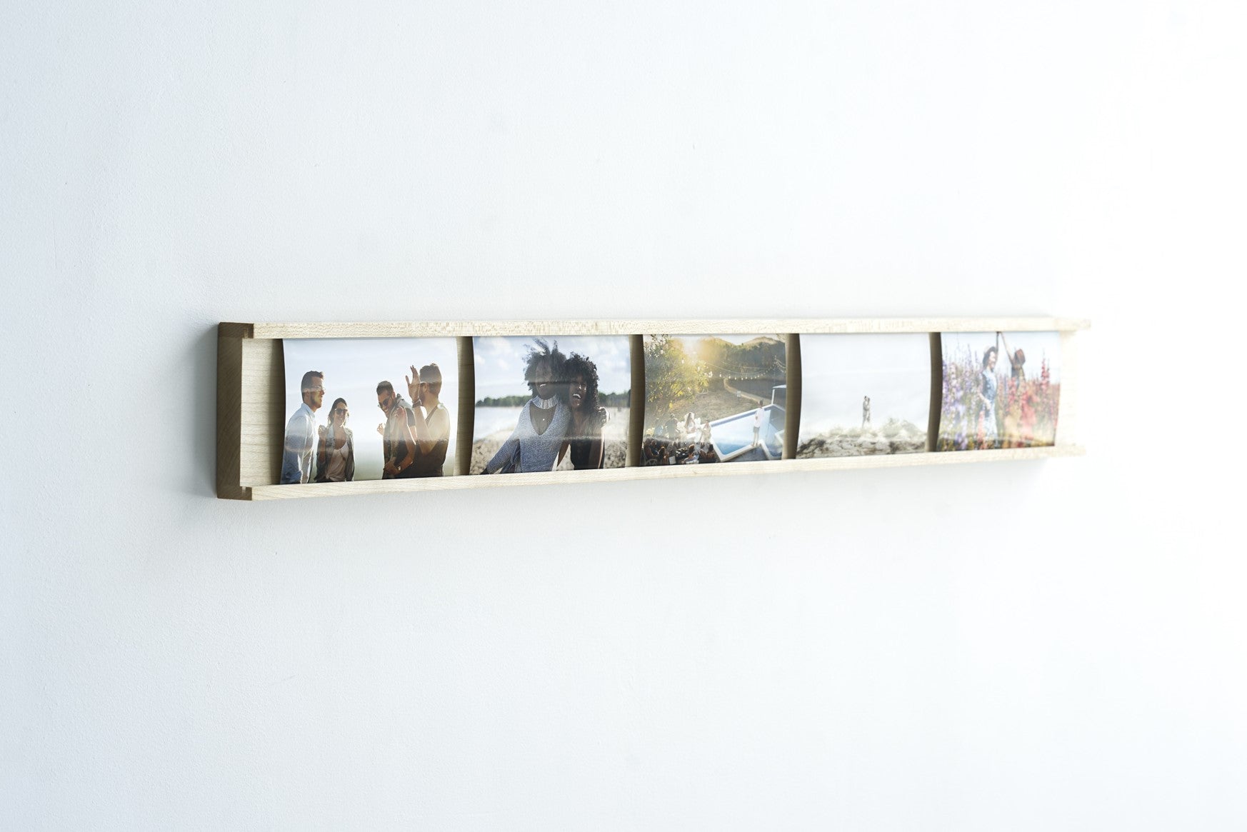 Daily Gallery Photo Bar Frame made of Maple hardwood, showcasing multiple 4x6 photos in a modern design.