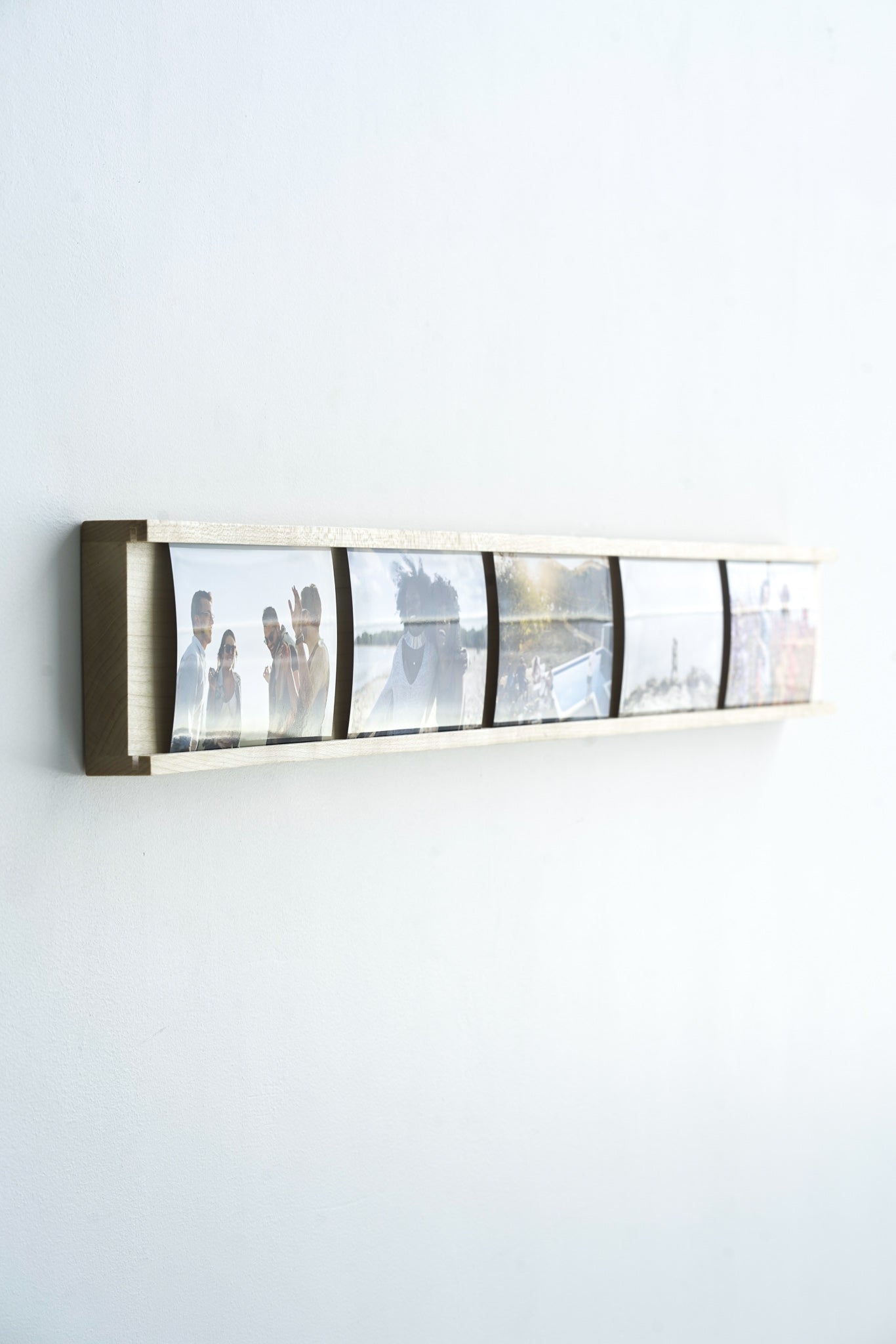 Daily Gallery Photo Bar Frame made of Maple hardwood, showcasing multiple 4x6 photos in a modern design.