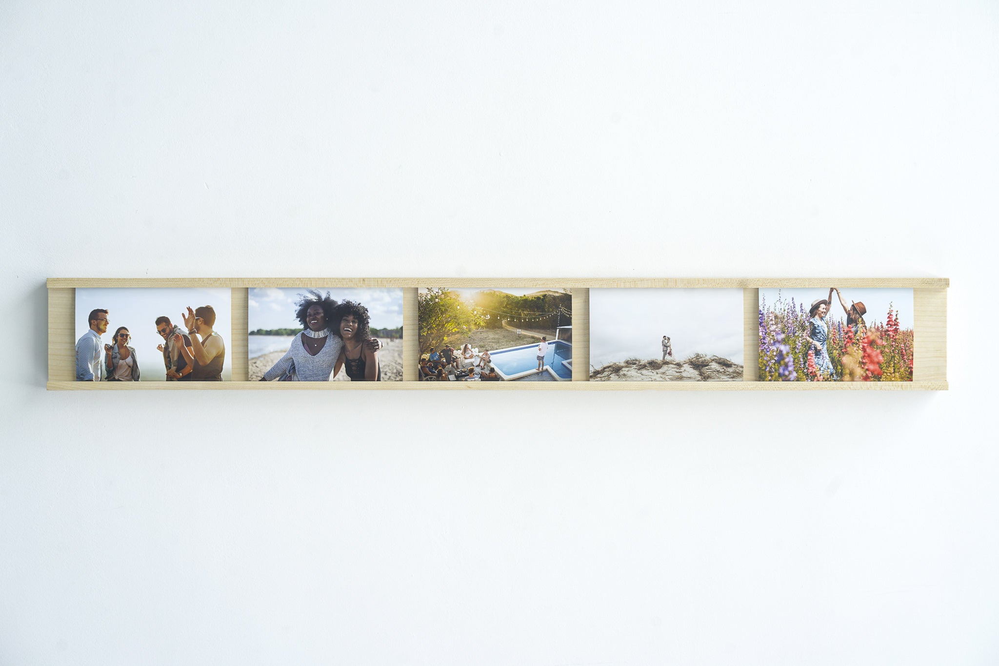 Daily Gallery Photo Bar Frame made of Maple hardwood, showcasing multiple 4x6 photos in a modern design.