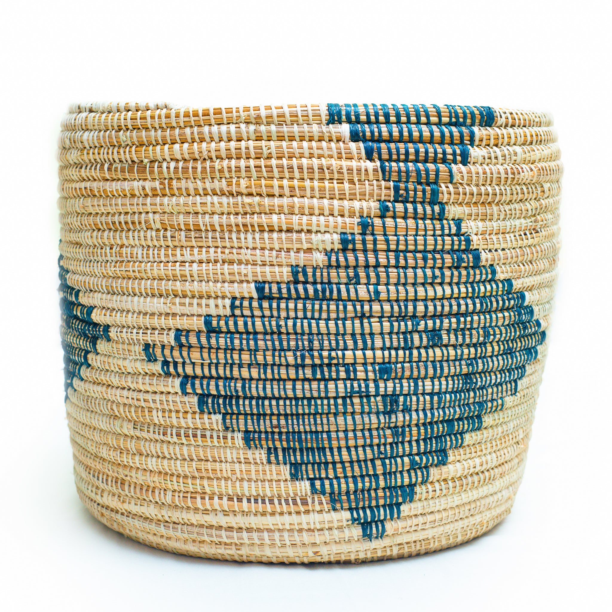 Darajani Handcrafted Basket showcasing vibrant colors and unique African weaving patterns, made from sustainable materials by skilled artisans.