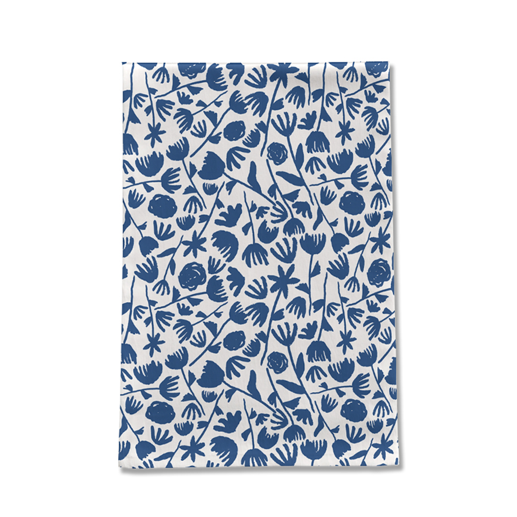 Dark blue floral tea towel made of cotton twill, featuring a charming floral design and hemmed edges, perfect for kitchen use.