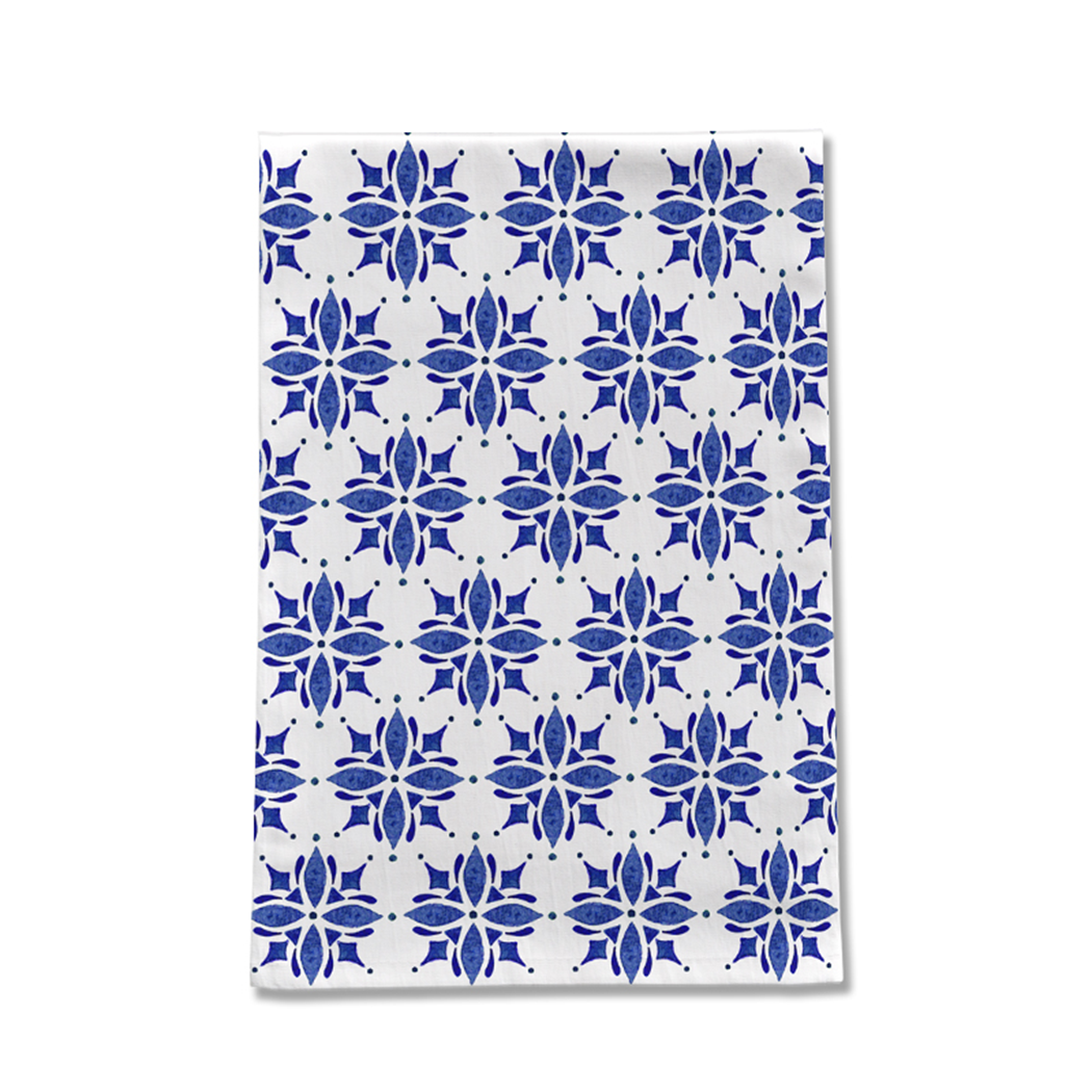 Dark blue tile tea towel made of cotton twill, featuring a charming design and hemmed edges, perfect for kitchen use.