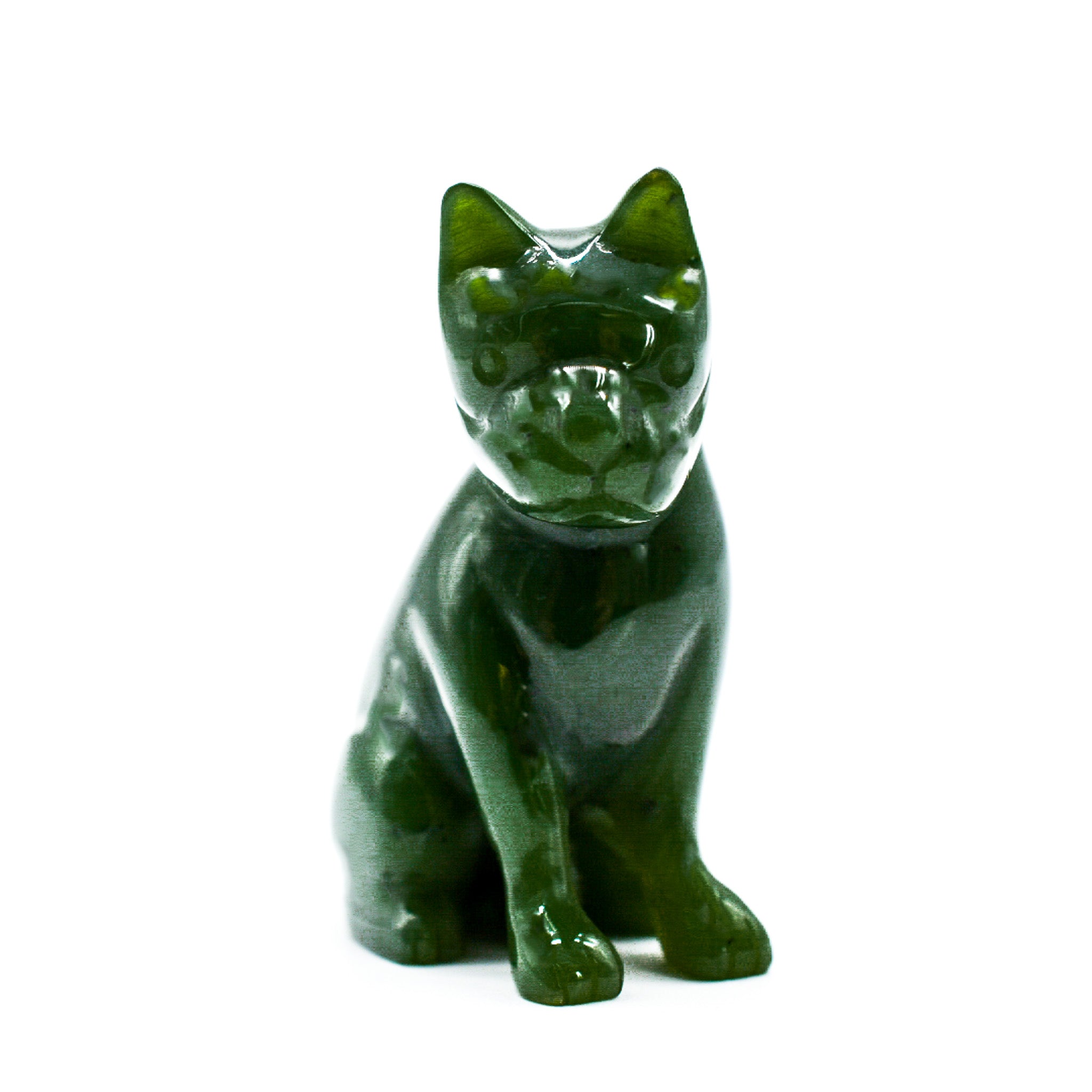 Handcrafted dark green jade dog figurines, showcasing intricate details and rich color, symbolizing luck and protection.