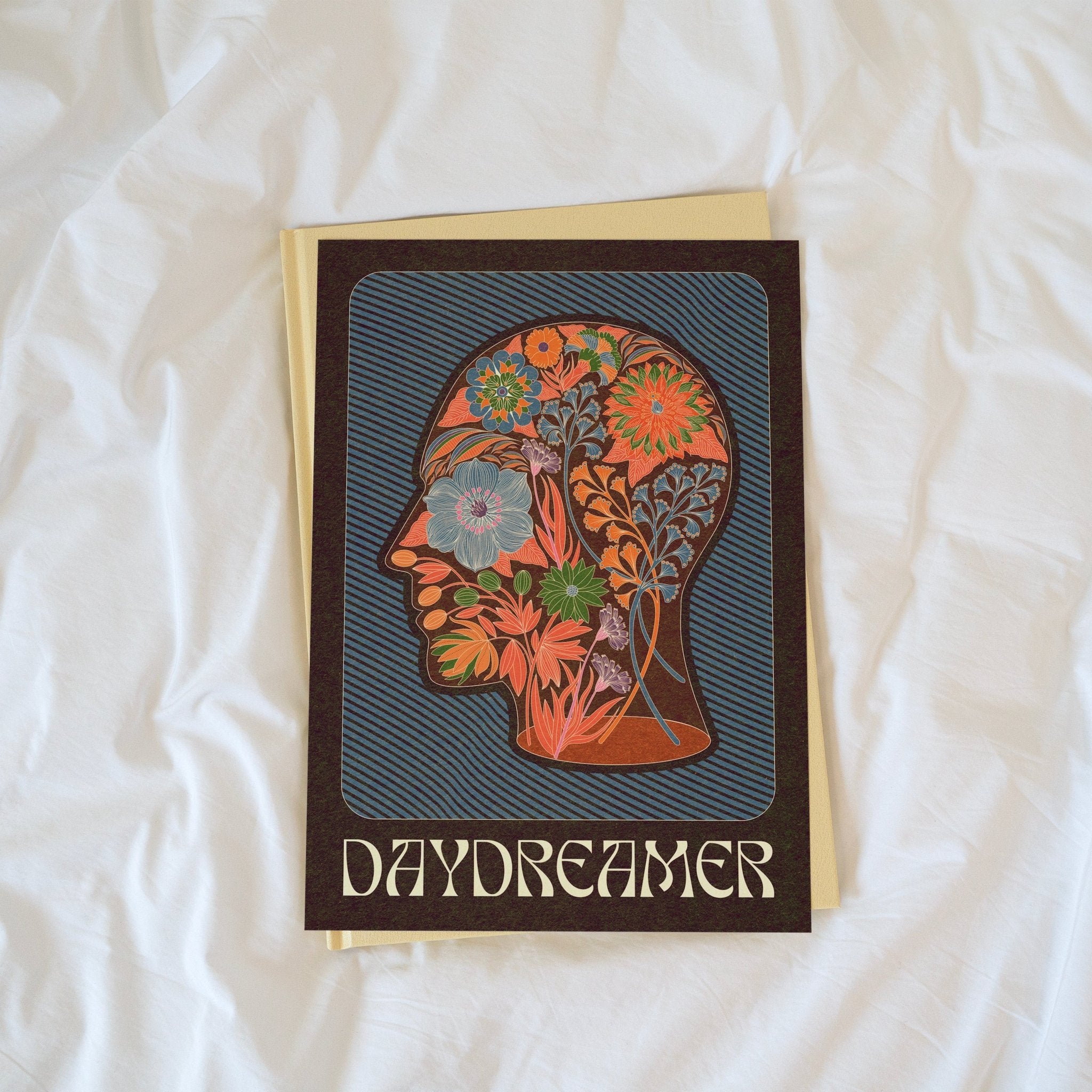 Daydreamer Art Print featuring a head silhouette filled with a boho floral pattern and the word 'Daydreamer' below.