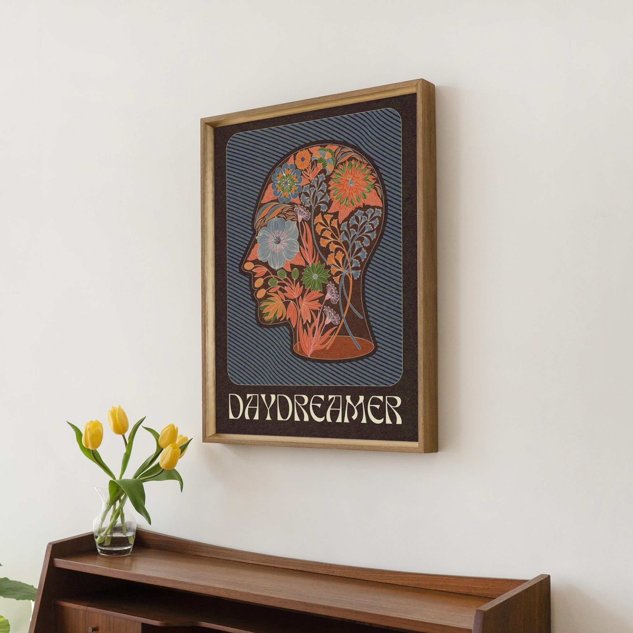 Daydreamer Art Print featuring a head silhouette filled with a boho floral pattern and the word 'Daydreamer' below.