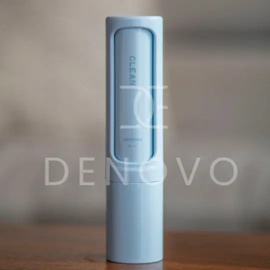 De Novo™ On-The-Go Lint Roller in a compact design, showcasing its self-cleaning feature and travel-friendly size.