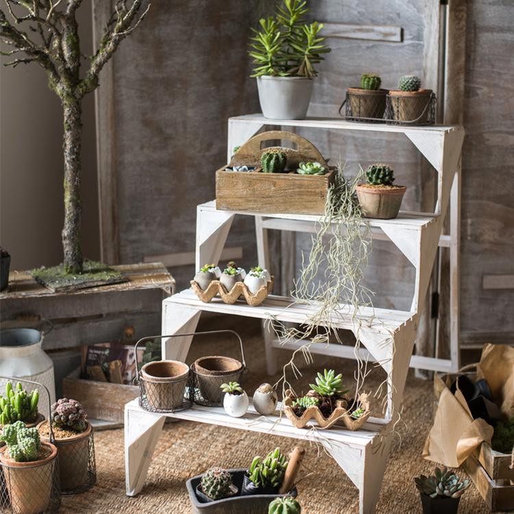 Decorative Eggshell Style Cement Planter in khaki and white colors, featuring a unique eggshell design, perfect for indoor decor.