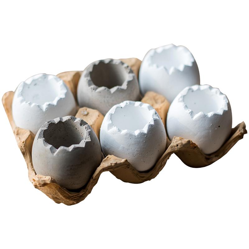 Decorative Eggshell Style Cement Planter in khaki and white colors, featuring a unique eggshell design, perfect for indoor decor.