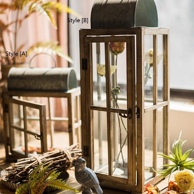 A beautifully crafted decorative table lantern made of wood and glass, featuring a rustic design with a candle inside, perfect for home decor.