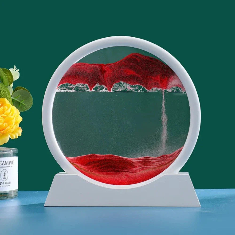 A beautiful 3D sand art piece depicting ocean waves, with layers of sand creating a mesmerizing effect, set in a round glass frame.