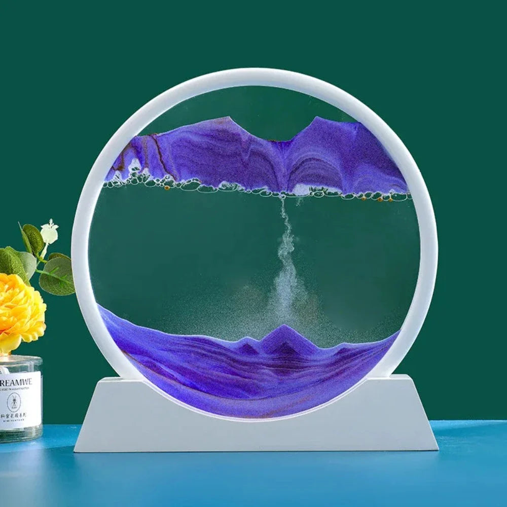 A beautiful 3D sand art piece depicting ocean waves, with layers of sand creating a mesmerizing effect, set in a round glass frame.