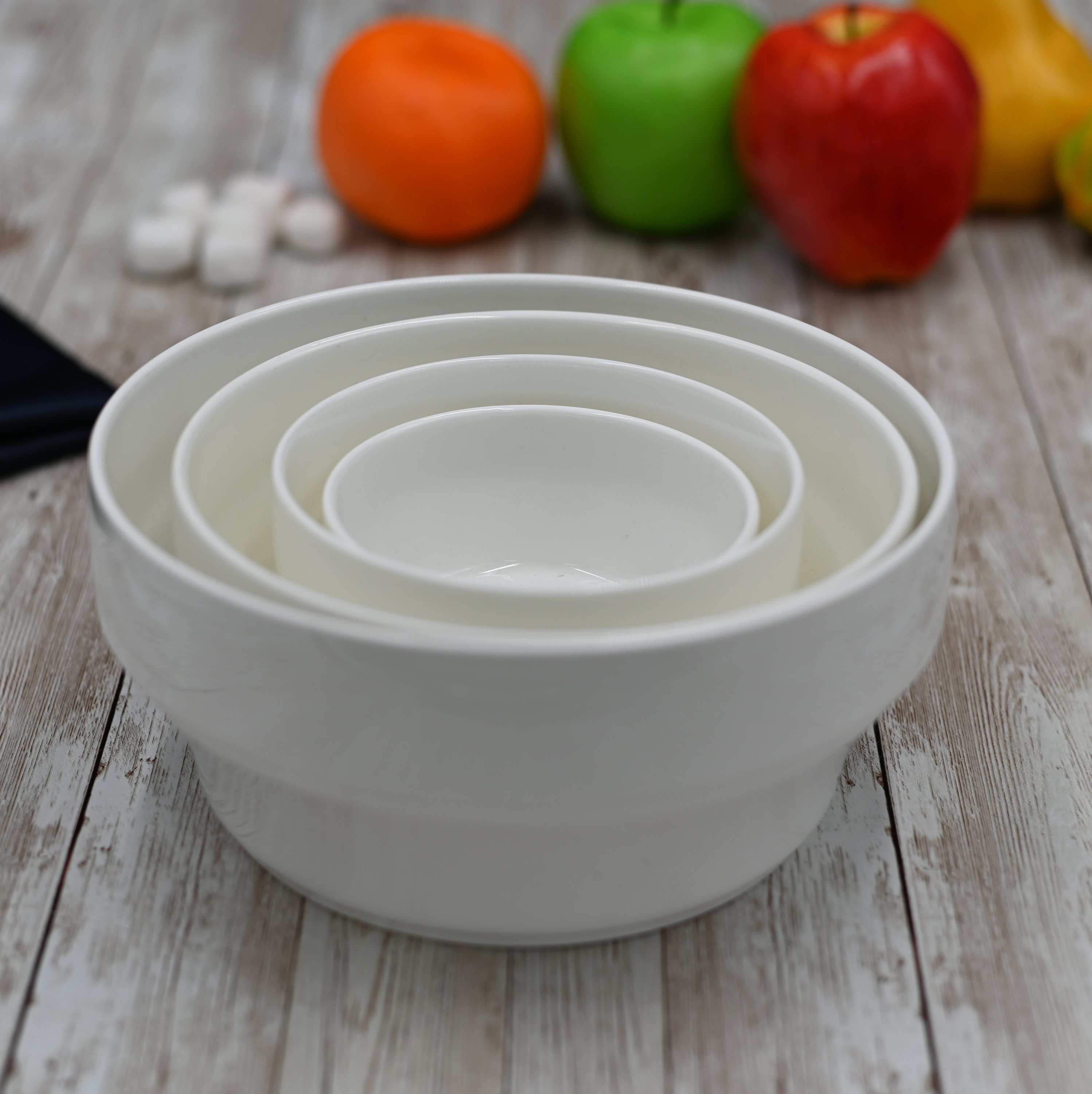 A 7-inch deep white bowl made of durable porcelain, perfect for serving soups, salads, and pasta, featuring a classic round design.