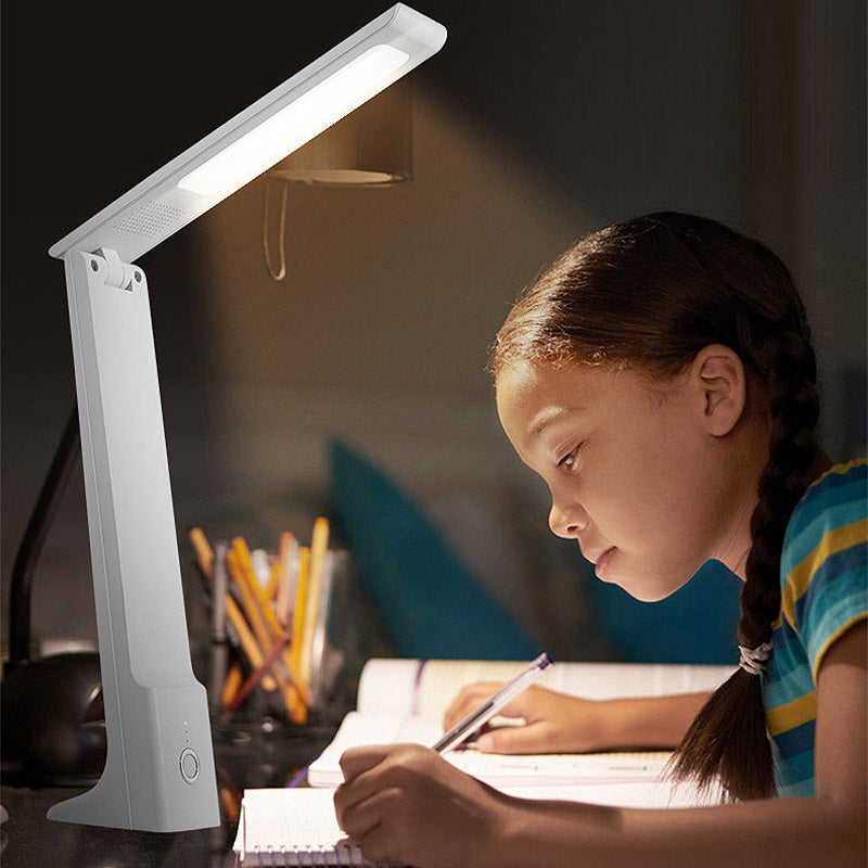 ANDREE rechargeable LED desk lamp in white, featuring adjustable arm and touch switch for light intensity and hue.