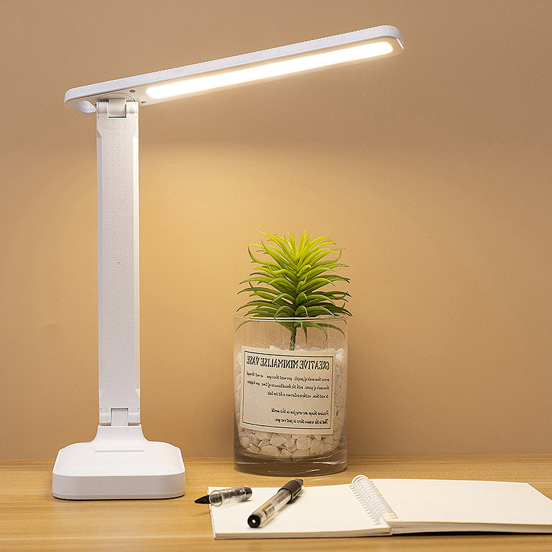 ROSA rechargeable LED desk lamp in white, featuring an adjustable arm and touch control for customizable lighting.