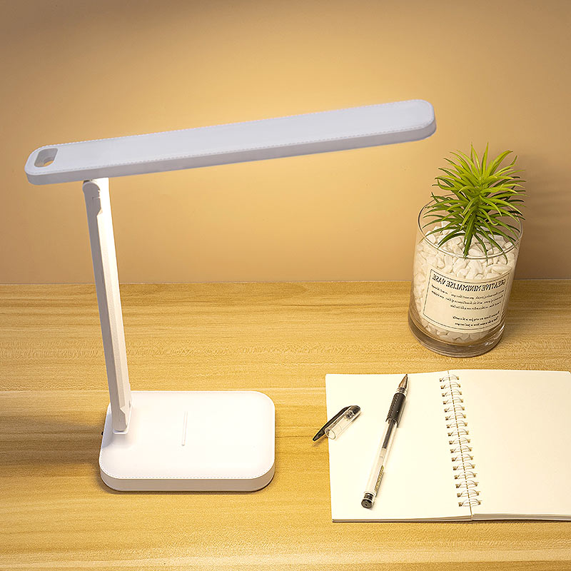 ROSA rechargeable LED desk lamp in white, featuring an adjustable arm and touch control for customizable lighting.