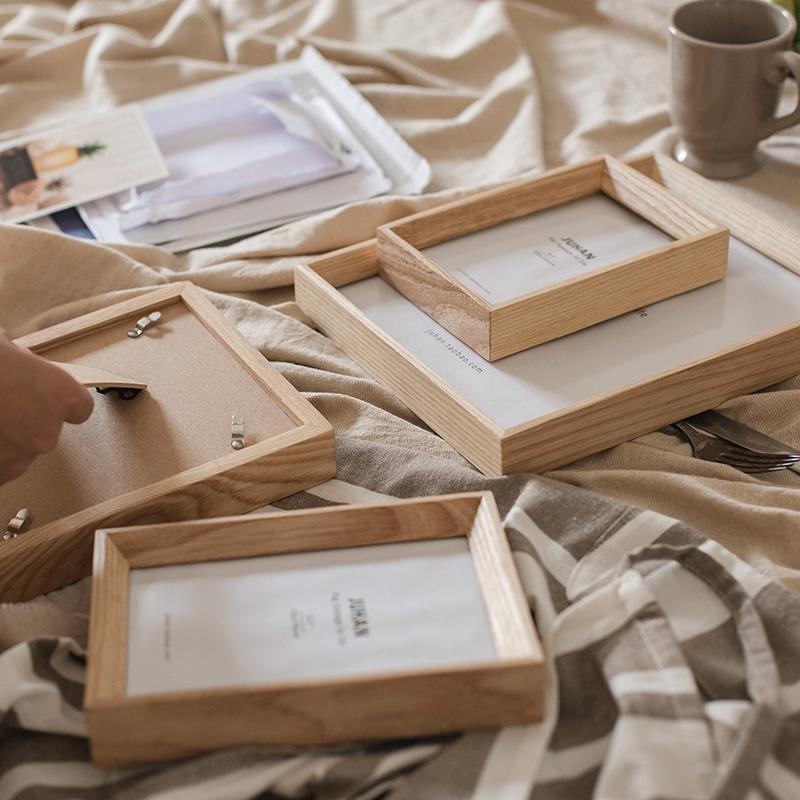 A handcrafted Desktop Solid Wood Photo Frame made from North American White Ash, showcasing a photo in a natural finish.