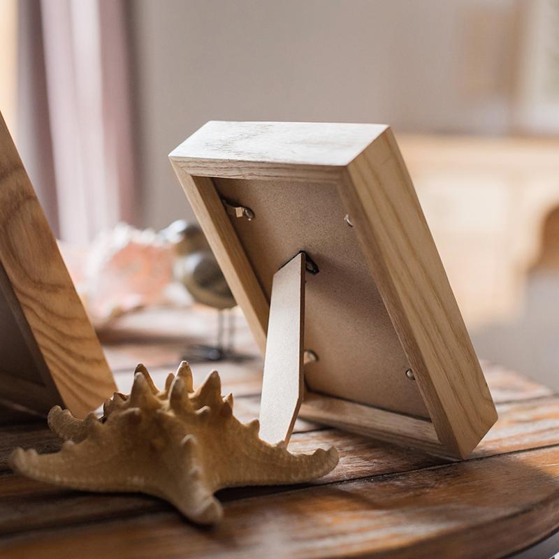 A handcrafted Desktop Solid Wood Photo Frame made from North American White Ash, showcasing a photo in a natural finish.