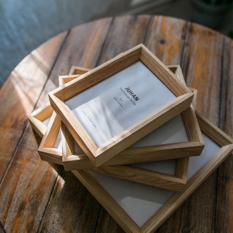 A handcrafted Desktop Solid Wood Photo Frame made from North American White Ash, showcasing a photo in a natural finish.