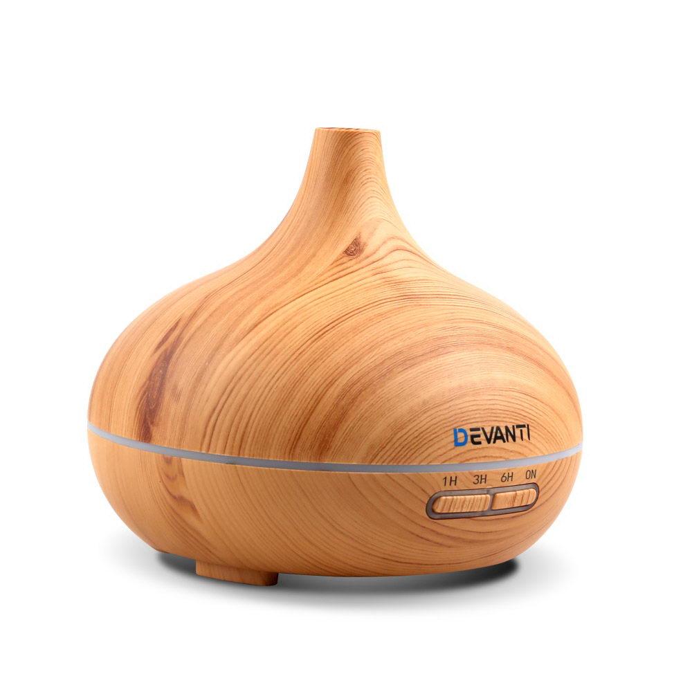 Devanti 300ml 4-in-1 Aroma Diffuser in light wood finish, showcasing its elegant design and LED light features.