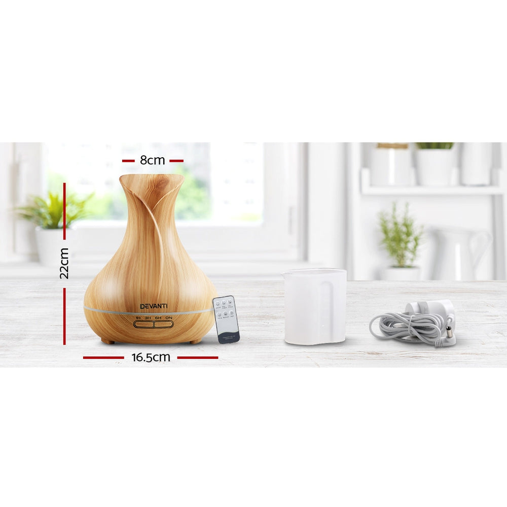 Devanti 400ml 4-in-1 Aroma Diffuser in light wood finish, showcasing its elegant design and remote control feature.