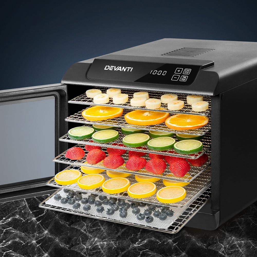 Devanti 6 Tray Food Dehydrator in black with stainless steel trays, showcasing its LCD control panel and transparent door.