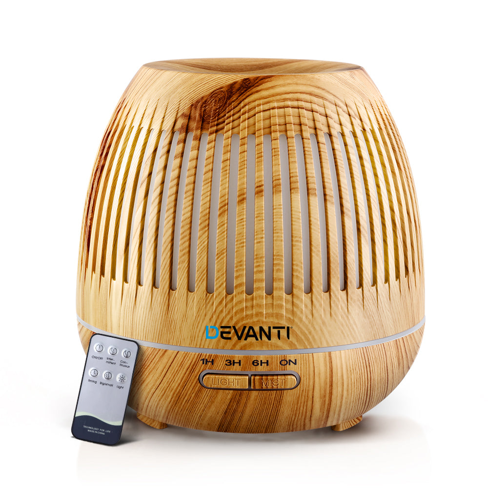 Devanti Aromatherapy Diffuser with wood grain design, LED lights, and remote control, showcasing its elegant and multifunctional features.