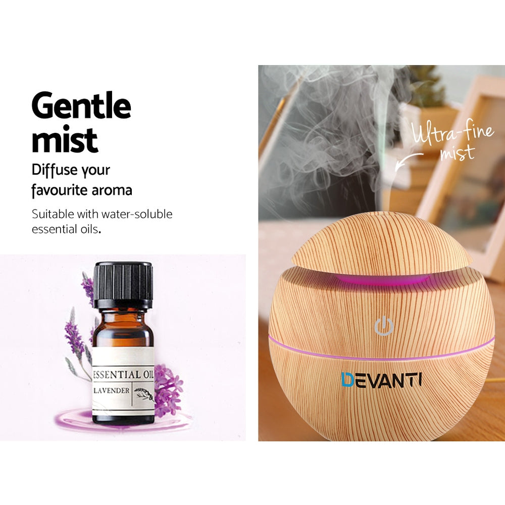 Devanti Aromatherapy Diffuser with wood grain design, showcasing LED lights and mist function.