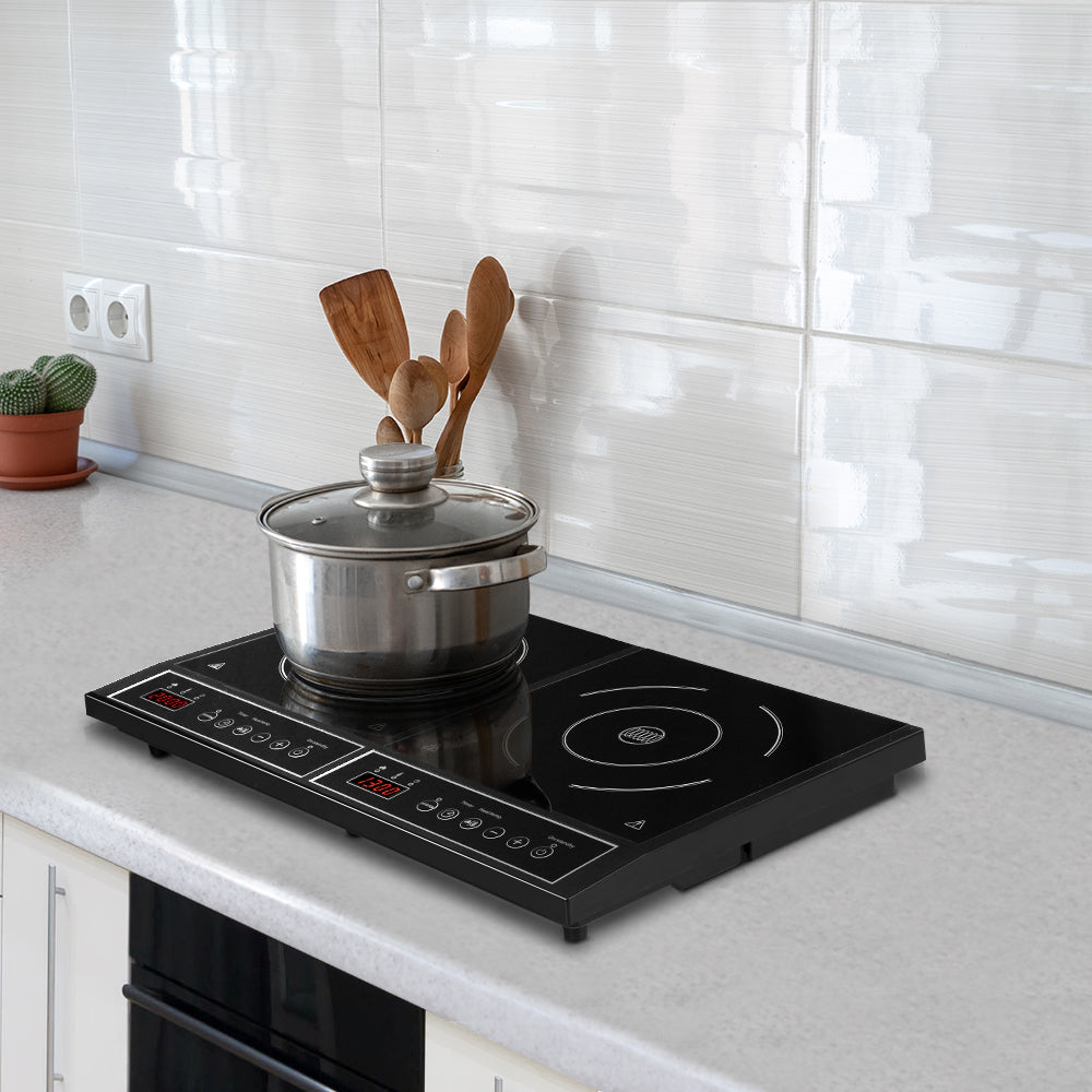 Devanti Portable Induction Cooktop 60cm with black ceramic glass surface and digital LED display, showcasing two cooking zones.