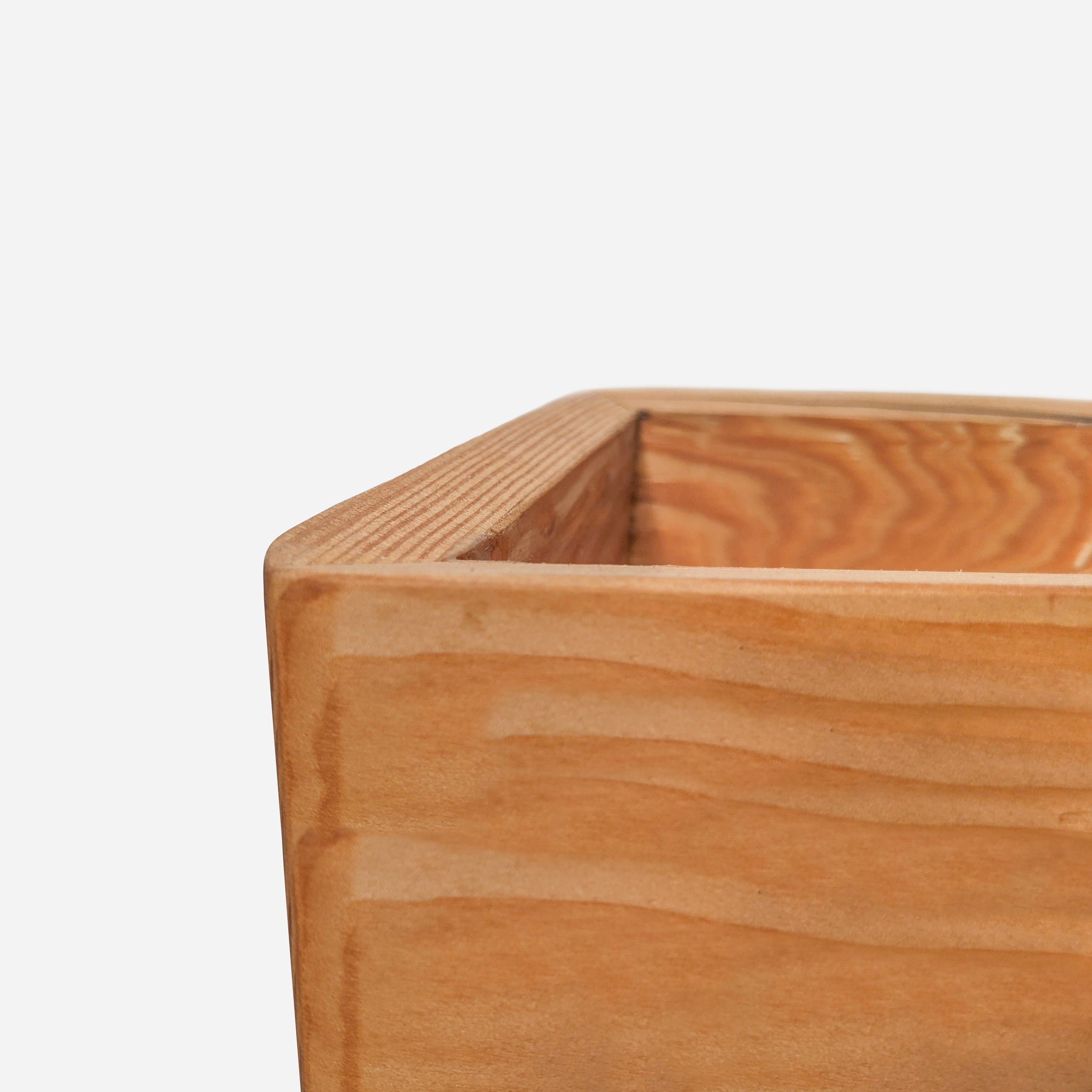 Diamond self-watering wall-mounted planter in wood, showcasing its unique shape and natural finish options.