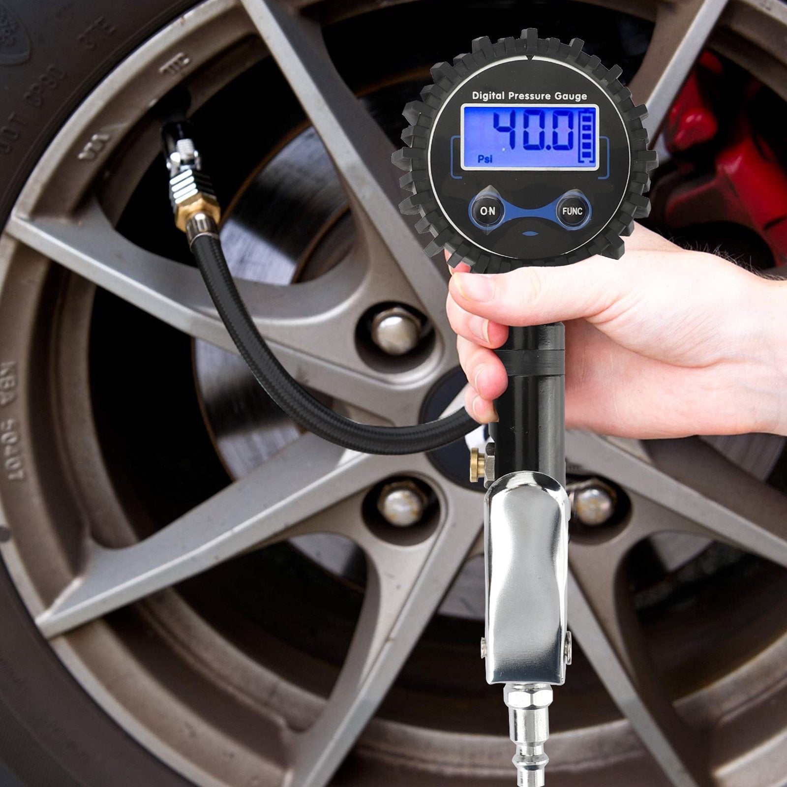 Digital Tyre Pressure Gauge with LCD display and accessories for accurate tyre pressure measurement.