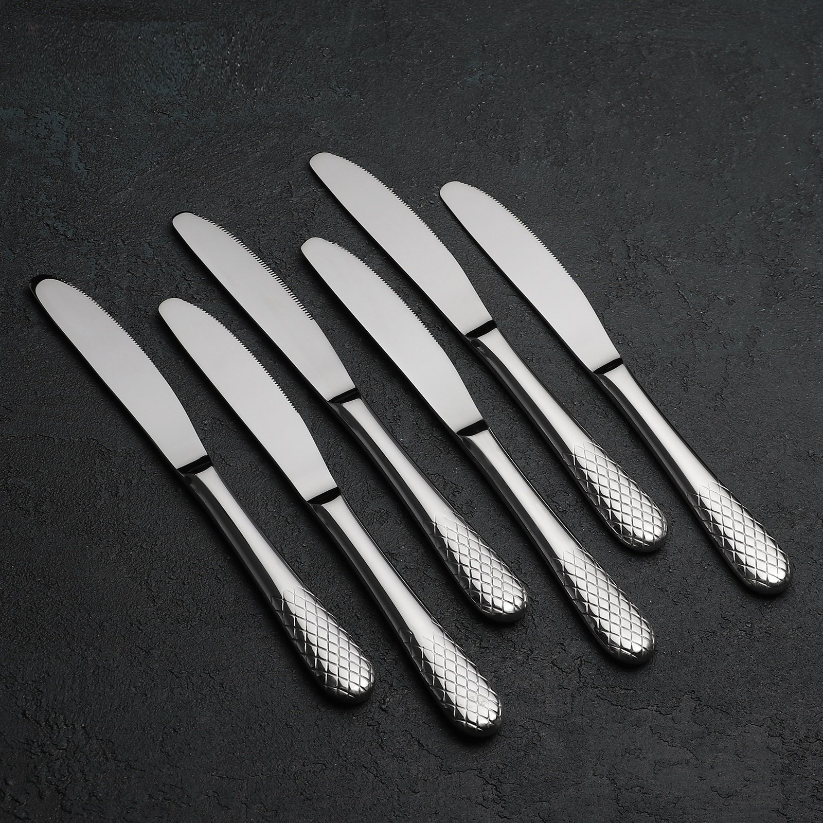 A set of six elegant WILMAX dinner knives, showcasing high polish stainless steel with finely balanced handles, presented in exquisite gift packaging.