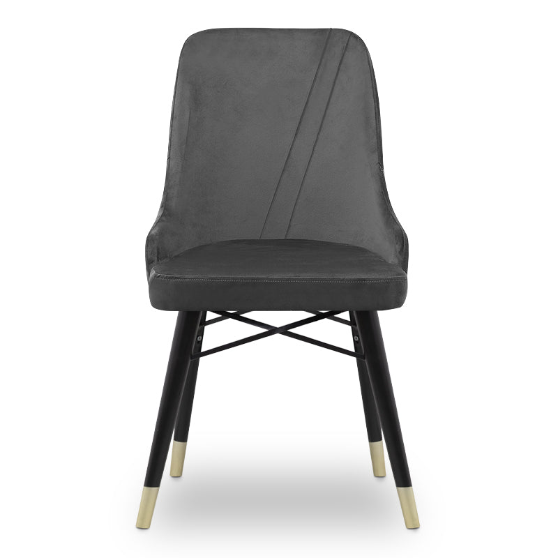 MARK velvet grey dining chair with black and gold legs, showcasing its luxurious design and plush upholstery.