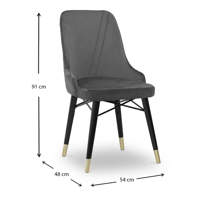 MARK velvet grey dining chair with black and gold legs, showcasing its luxurious design and plush upholstery.