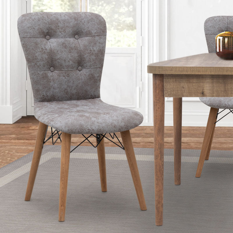 Set of four MICHELLE dining chairs in grey fabric with walnut legs, showcasing elegant design and comfortable seating.