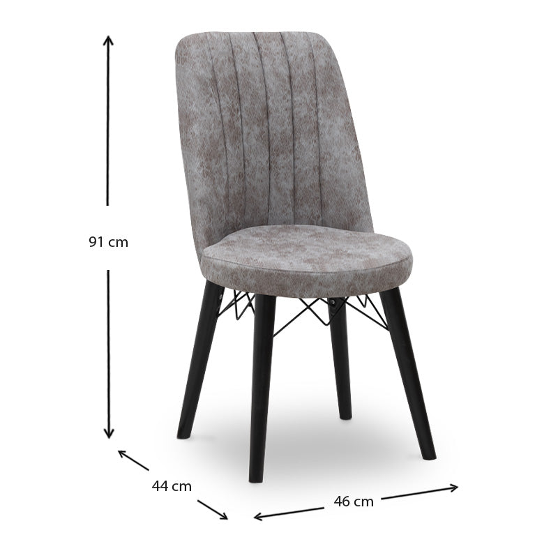 RALU velvet dining chair in grey with black wooden legs, showcasing its elegant design and plush upholstery.