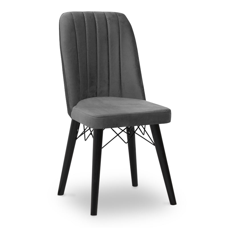 ALFONSO Grey velvet dining chair with black legs and gold detailing, showcasing luxury and elegance.