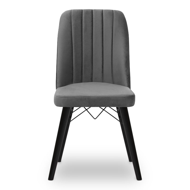 ALFONSO Grey velvet dining chair with black legs and gold detailing, showcasing luxury and elegance.