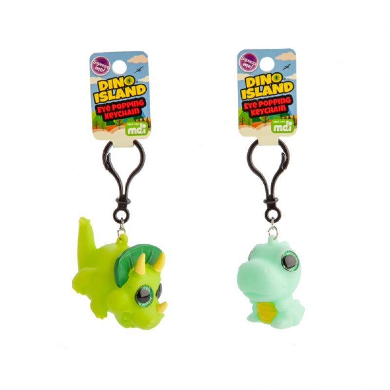 A colorful Dino Island Eye Popping Keychain featuring a T-Rex and Triceratops with big sparkly eyes that pop out when squeezed.