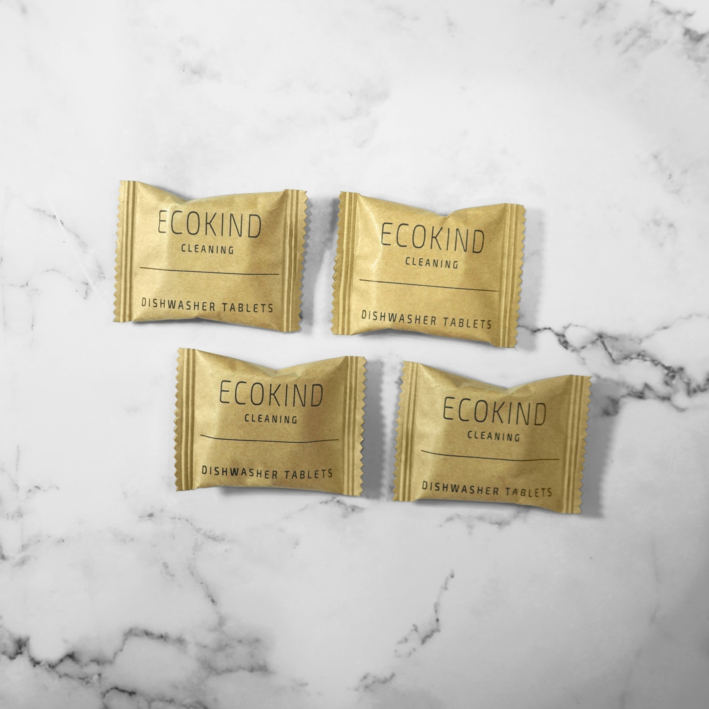 ECOKIND Cleaning dishwasher tablets in eco-friendly packaging, showcasing their plastic-free and plant-based ingredients for effective dish cleaning.