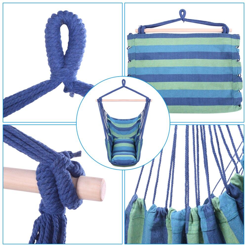 Distinctive blue striped cotton canvas hanging rope chair with pillows, designed for outdoor relaxation and comfort.