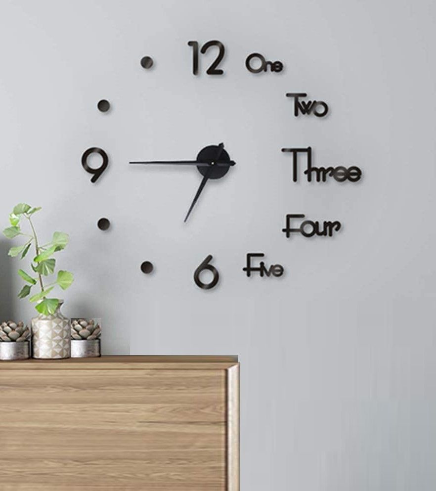 Large modern DIY wall clock with frameless design and giant Roman numerals, reflecting light beautifully.