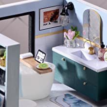 A beautifully crafted dollhouse miniature featuring intricate furniture, LED lights, and a dust-proof design, perfect for collectors and gifts.