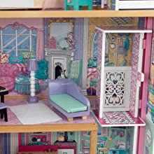 A colorful wooden dollhouse with three levels, four rooms, and a balcony, featuring a gliding elevator and 17 pieces of furniture for imaginative play.