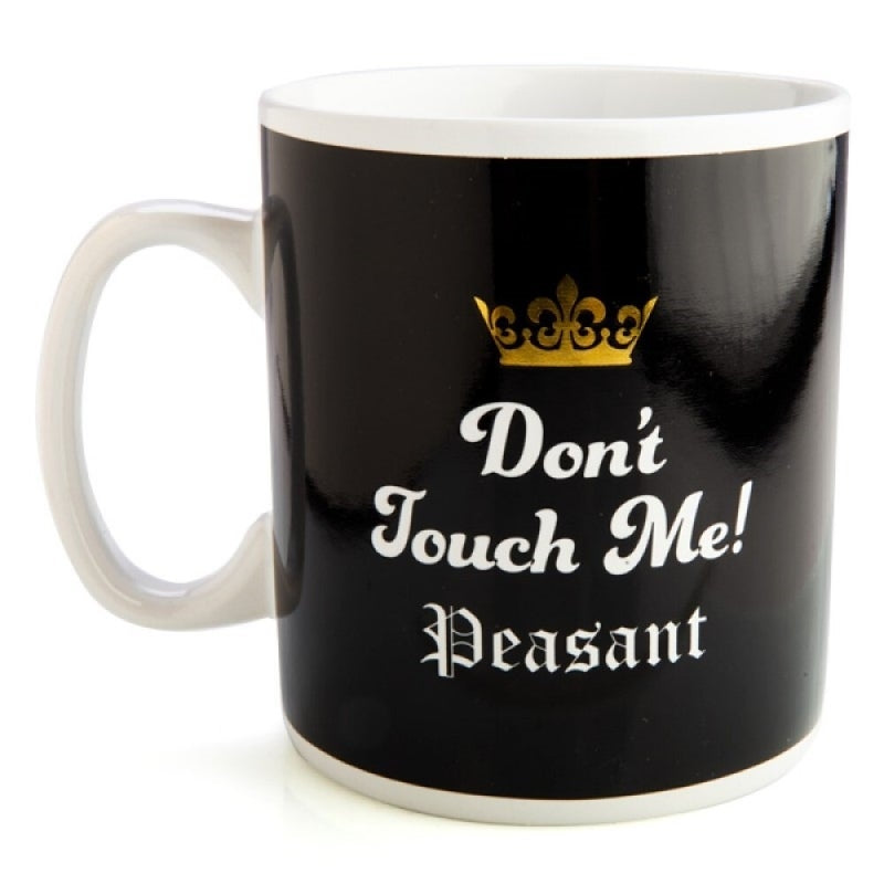 A large black coffee mug with the quote 'Don't touch me! Peasant' in white text and a shiny gold crown icon, showcasing its sassy design.