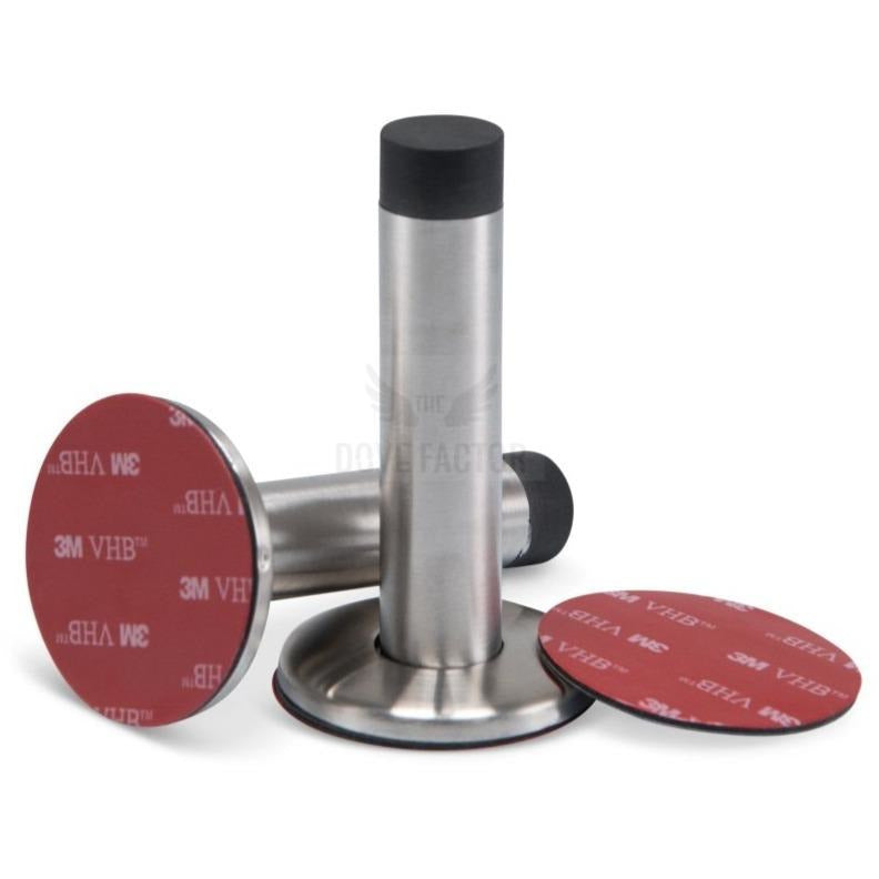 The Dove Factor™ Adhesive Door Stopper in stainless steel and rubber, designed to protect walls and furniture from door damage.