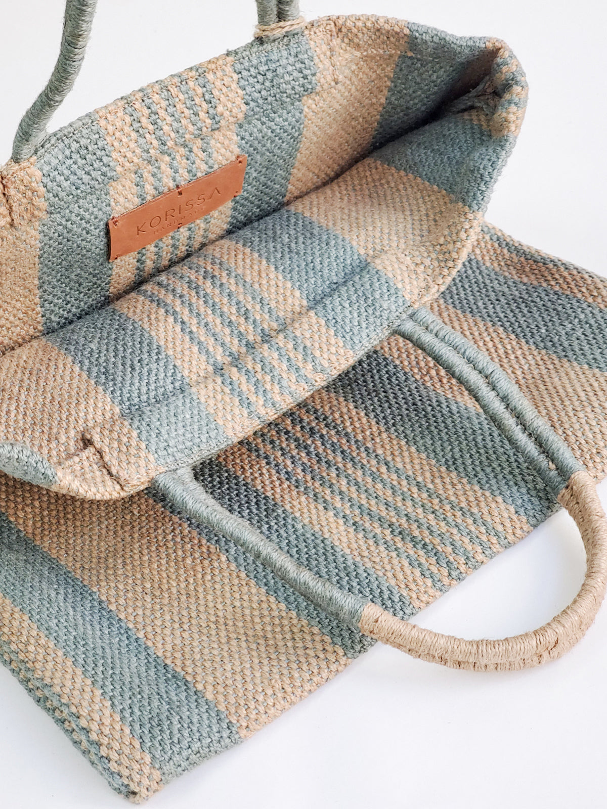 Dora Jute Tote Bag in pale green, handwoven and stylish, perfect for daily use and markets.