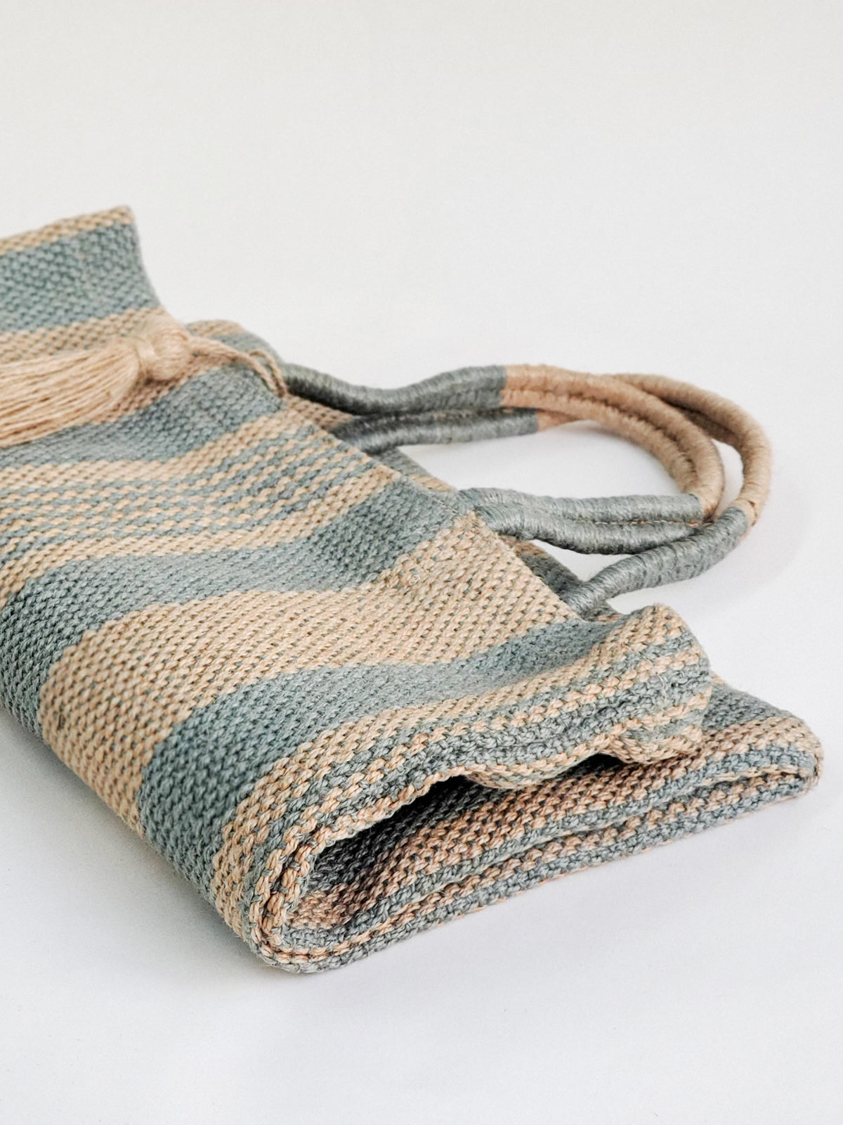 Dora Jute Tote Bag in pale green, handwoven and stylish, perfect for daily use and markets.